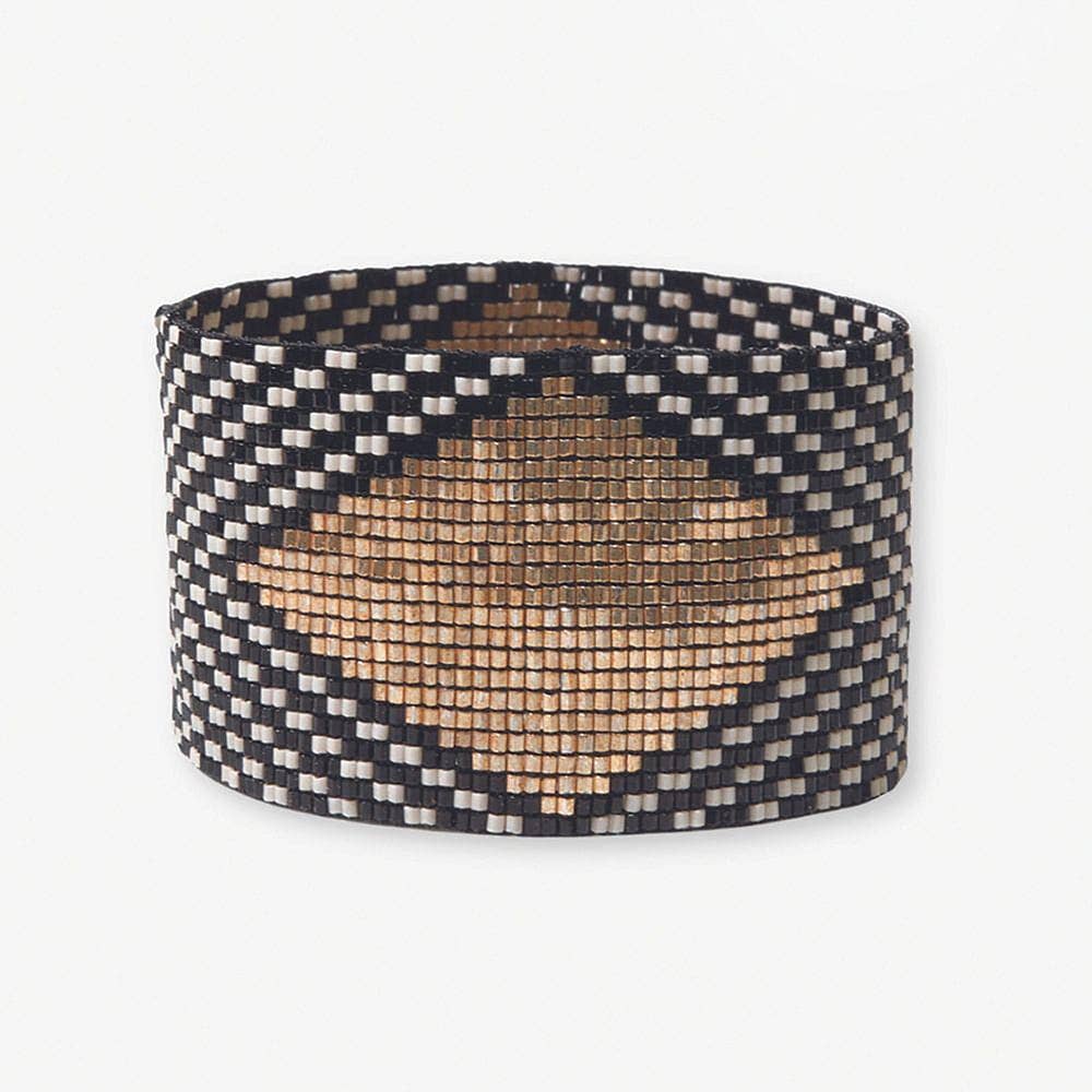 Woven basket with a geometric pattern on a white background