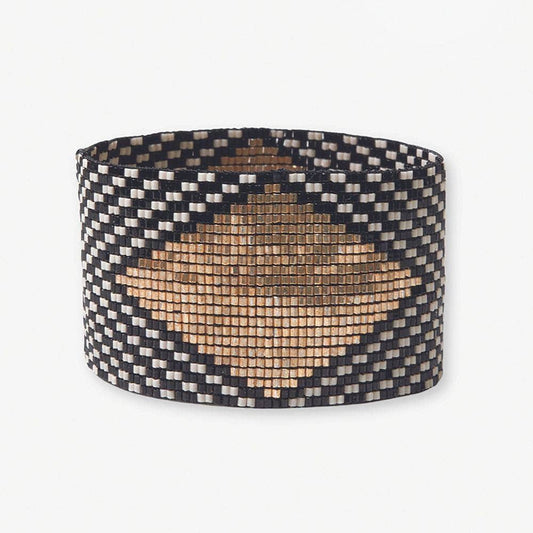 Woven basket with a geometric pattern on a white background
