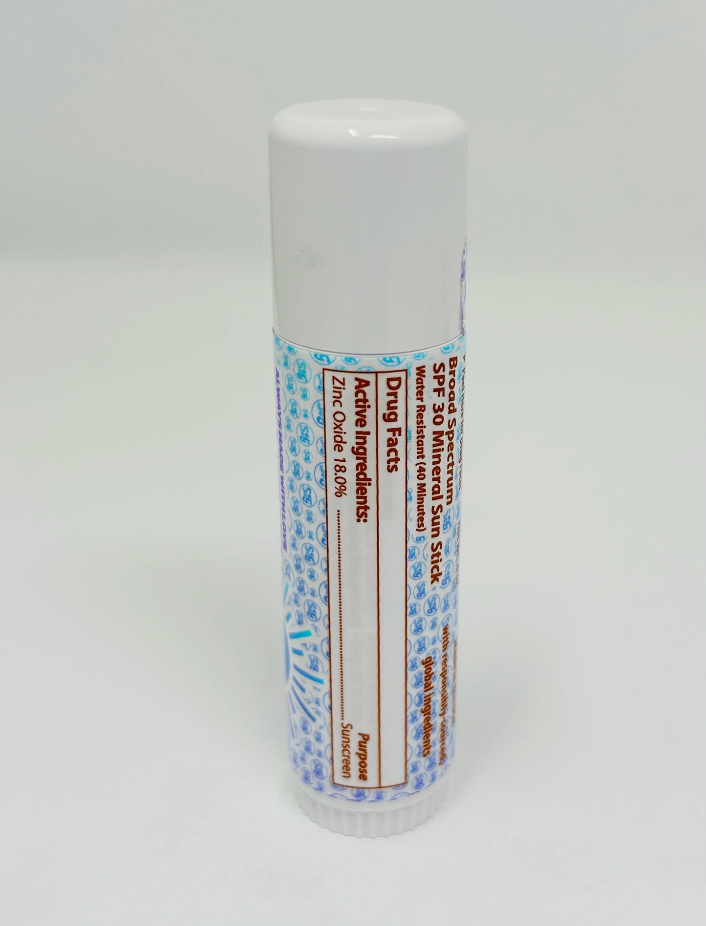 White sun stick with blue label on a white background