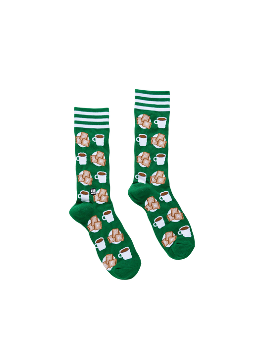 Green socks with coffee-themed design on a white background