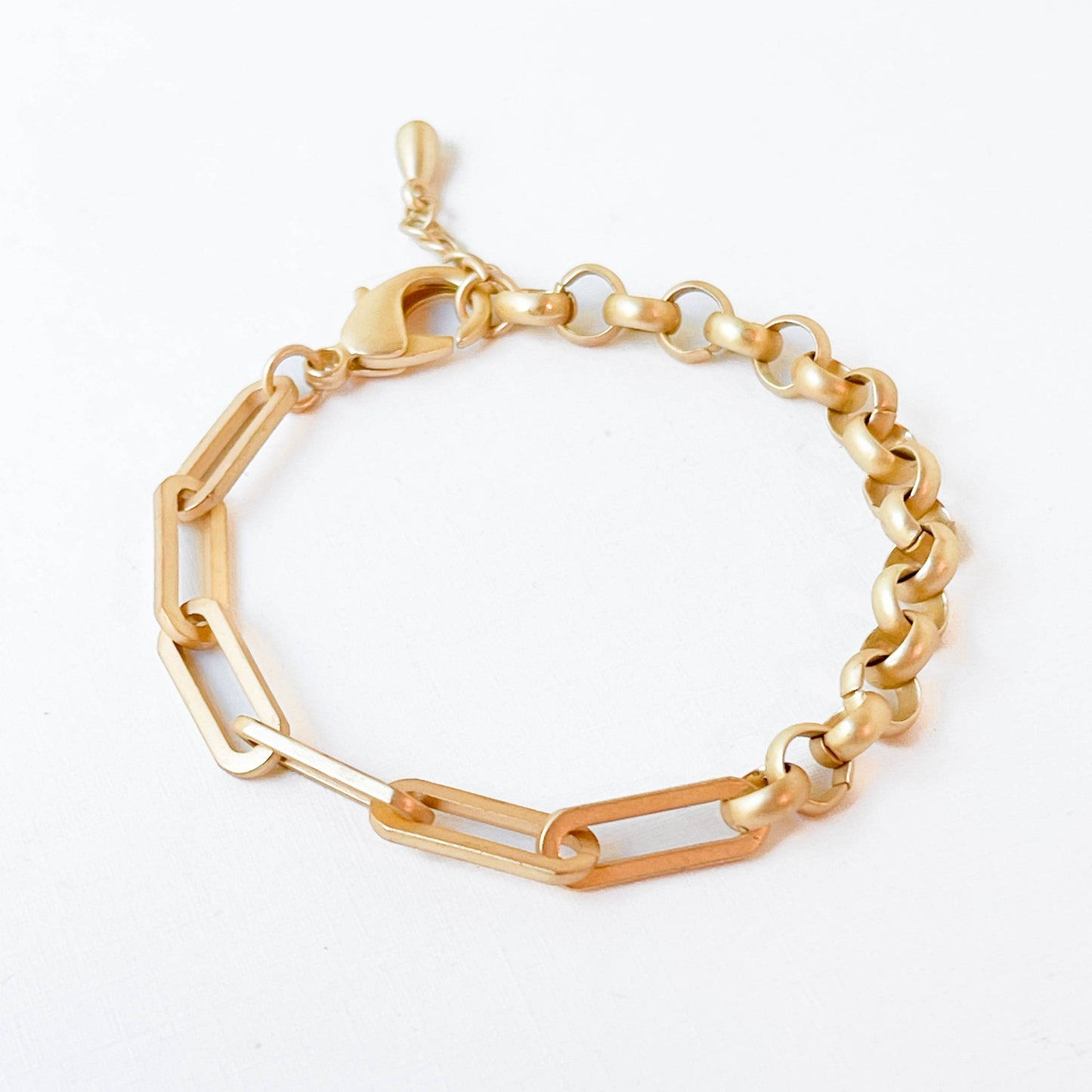 Gold chain bracelet on a white background