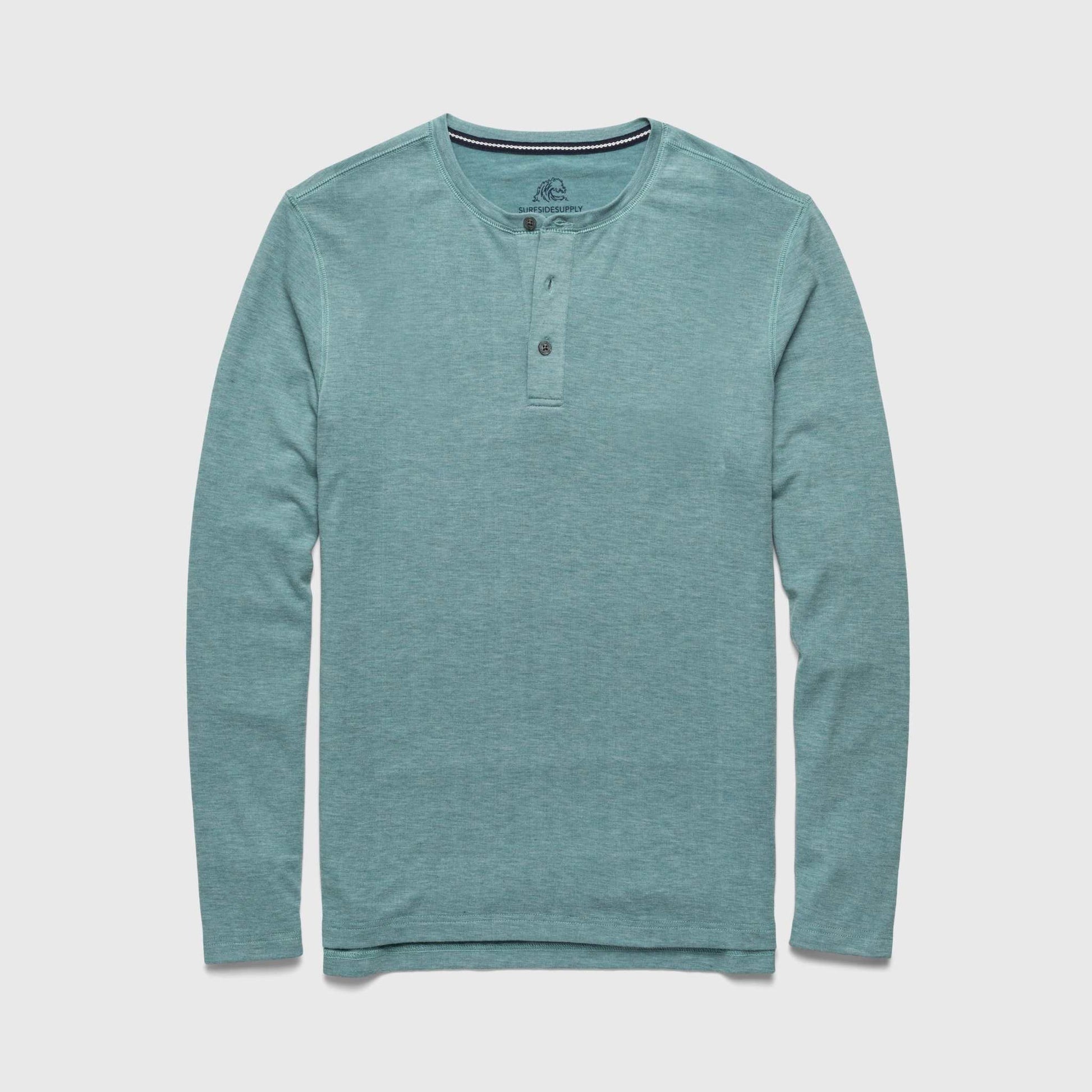 Teal long-sleeve henley shirt on a light gray background