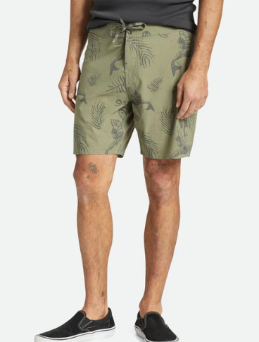 A pair of olive green and charcoal patterned shorts with a fixed waistband and tie closure.