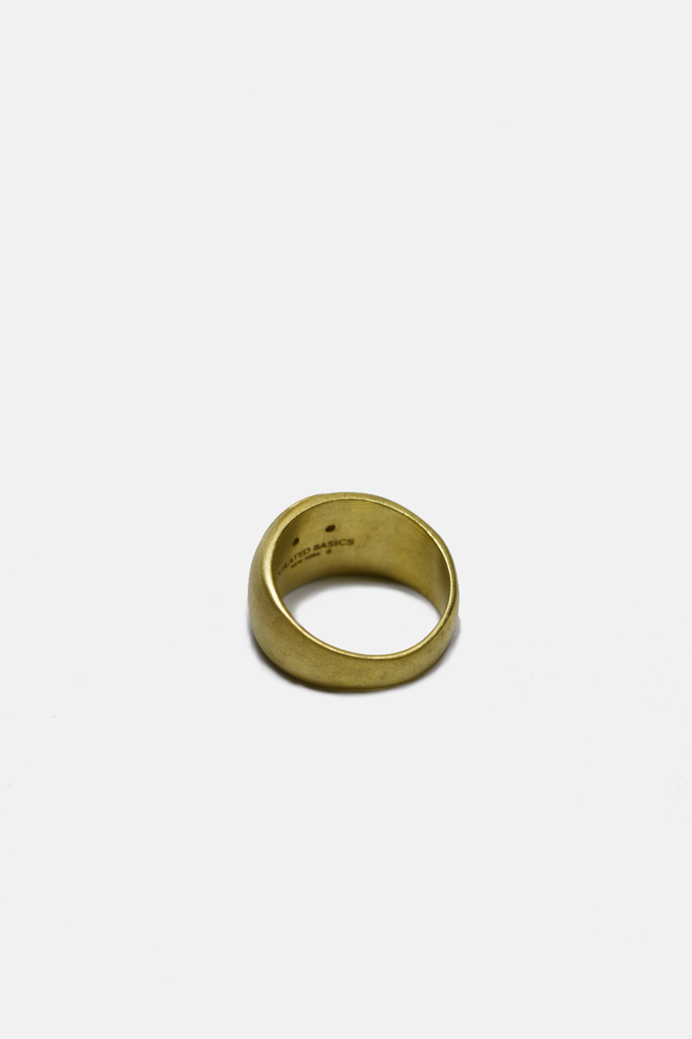 Gold ring on a white background