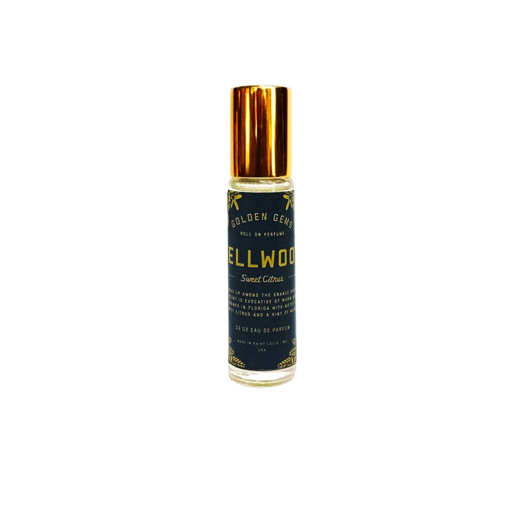 Perfume bottle with gold cap on a white background