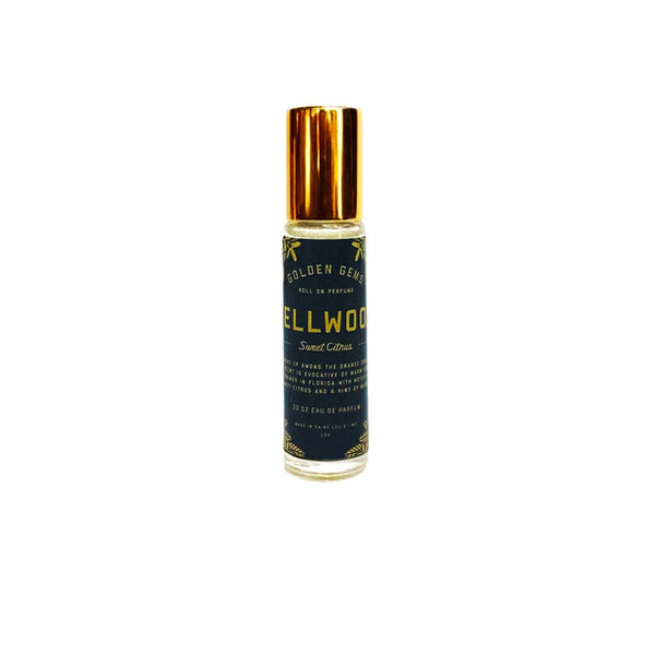 Perfume bottle with gold cap on a white background