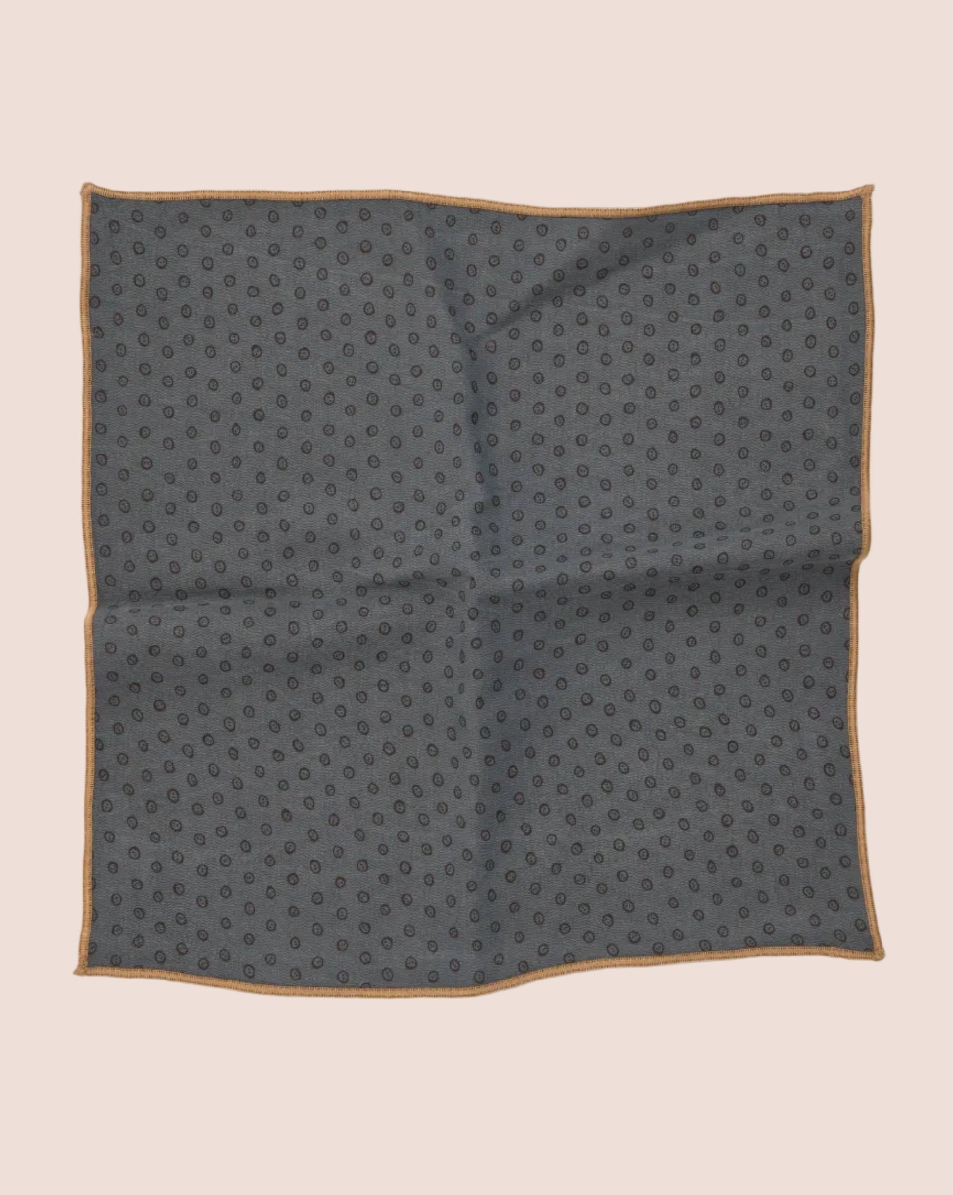 Gray pocket square with a subtle pattern on a light gray background