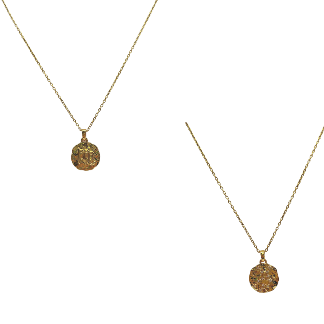 Two gold necklaces with circular pendants on a white background