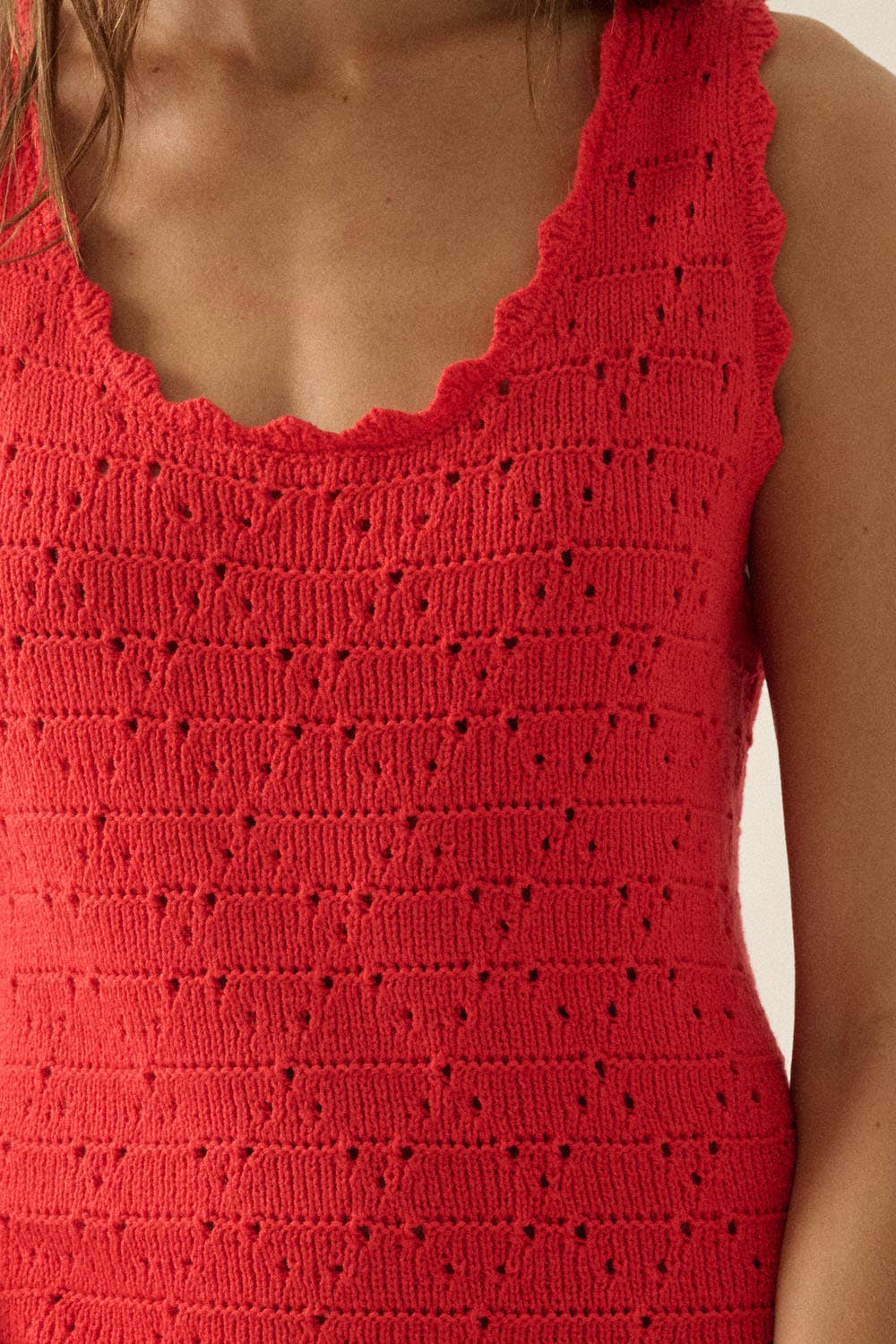 Red crochet top worn by a person