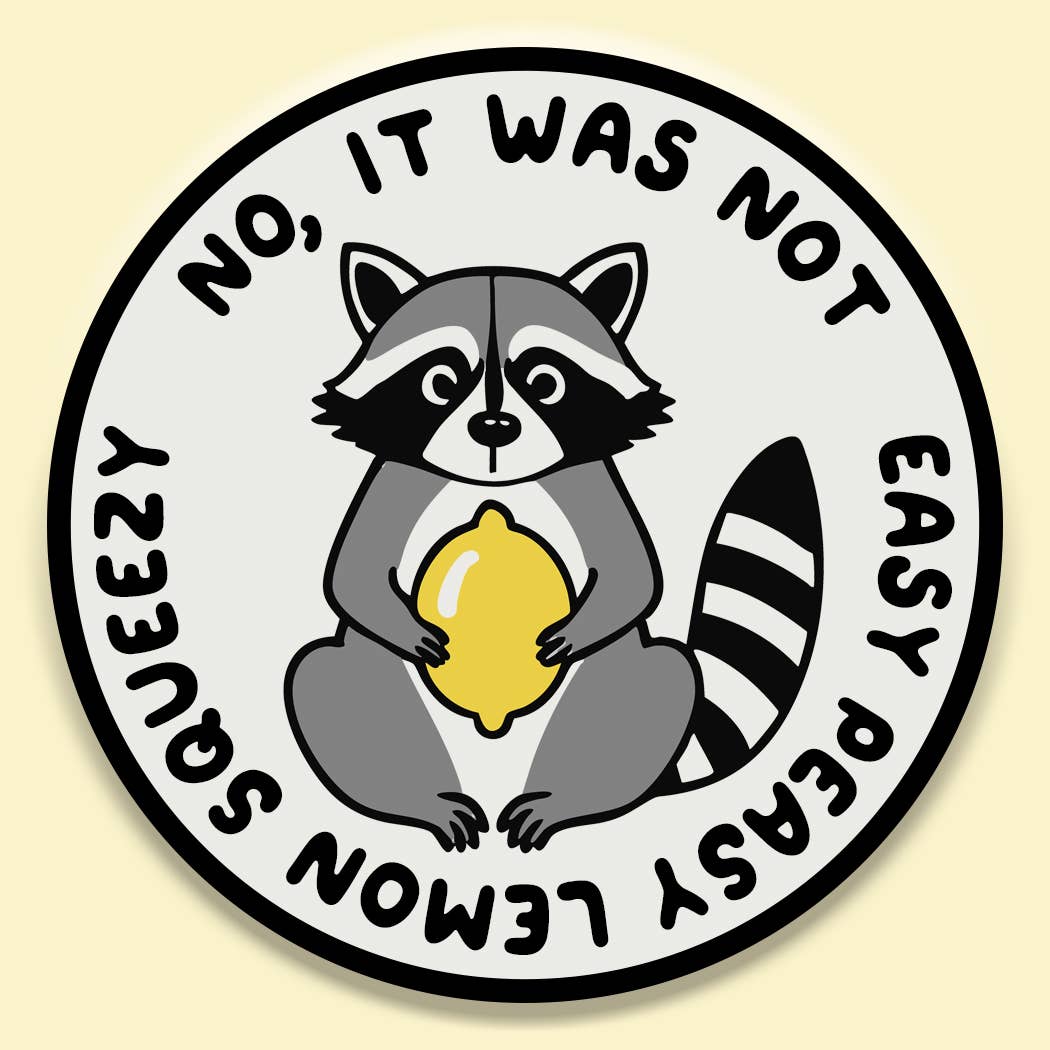 Circular sticker with a raccoon holding a lemon and text on a beige background