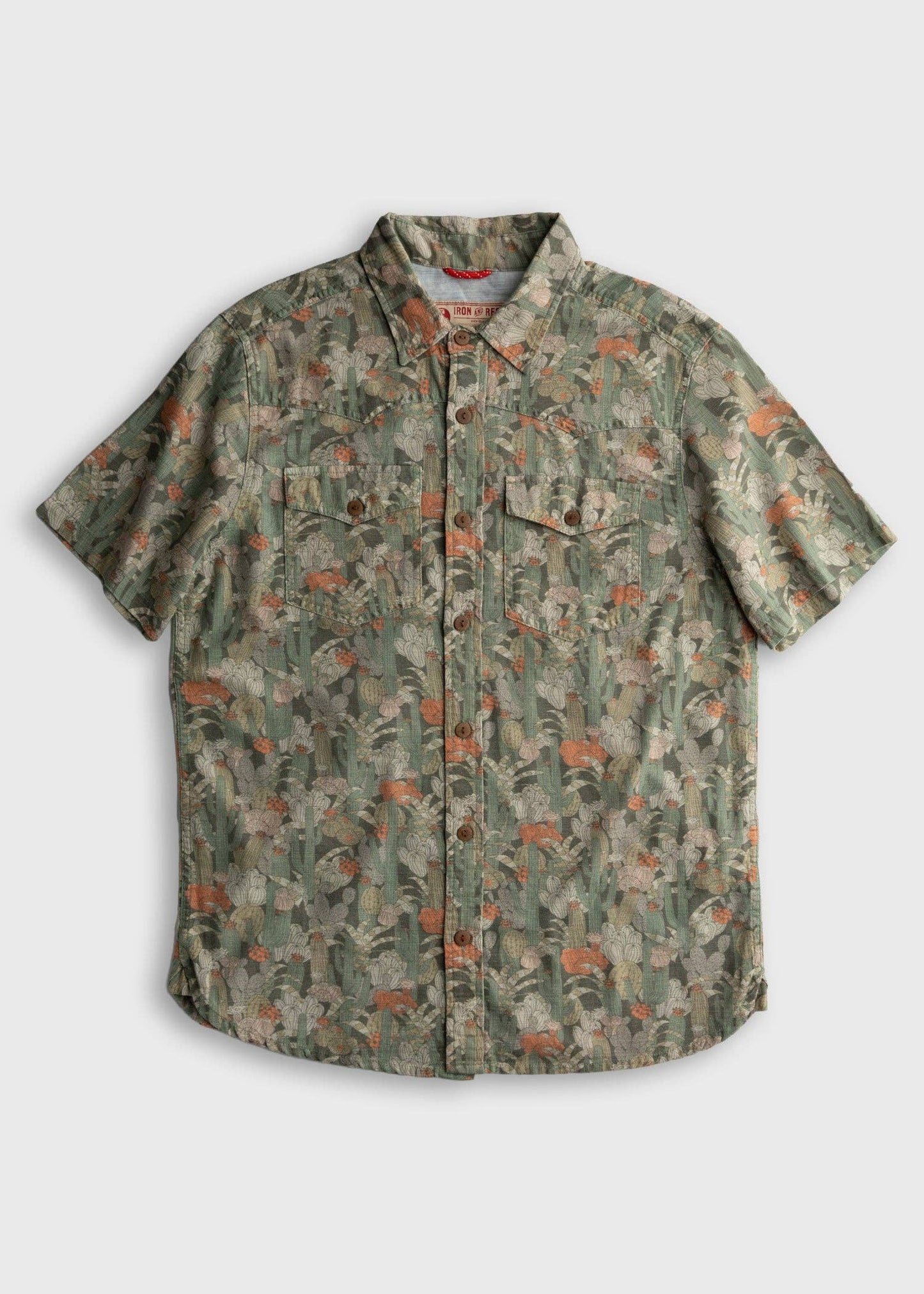 Short-sleeve shirt with a floral pattern on a light gray background