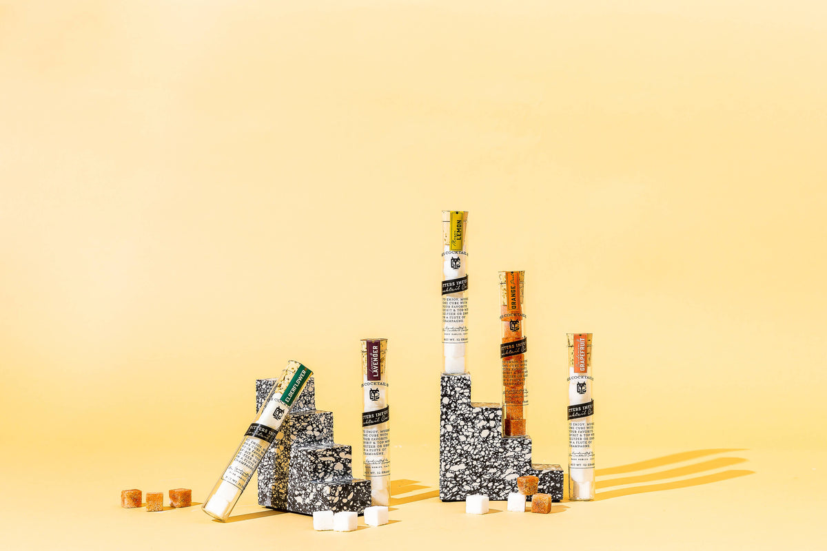 Stacked building blocks on a yellow background