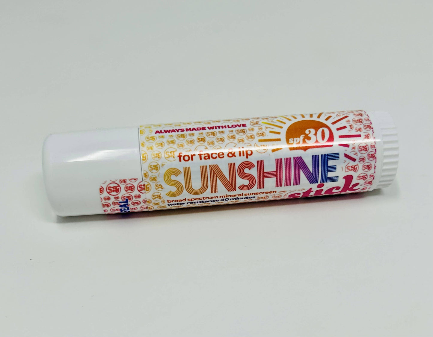 Sunshine stick for face and lip on a white background