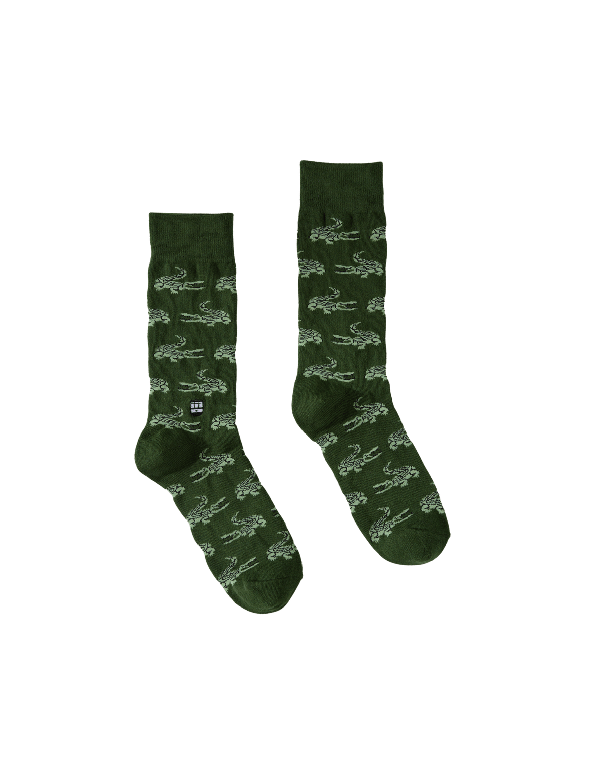 Green socks with white patterns on a white background