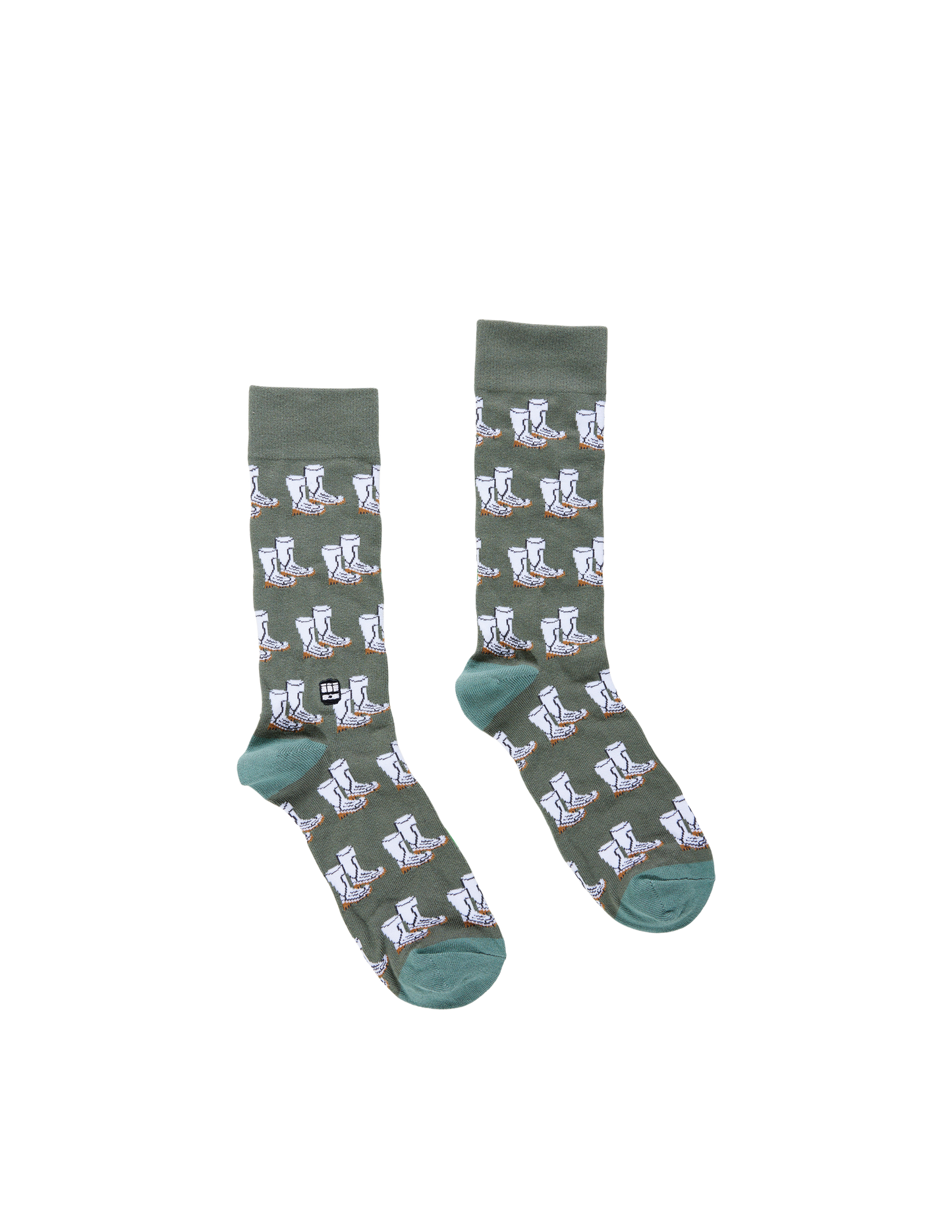 Green socks with white patterns on a white background