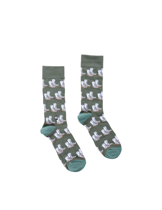 Green socks with white patterns on a white background