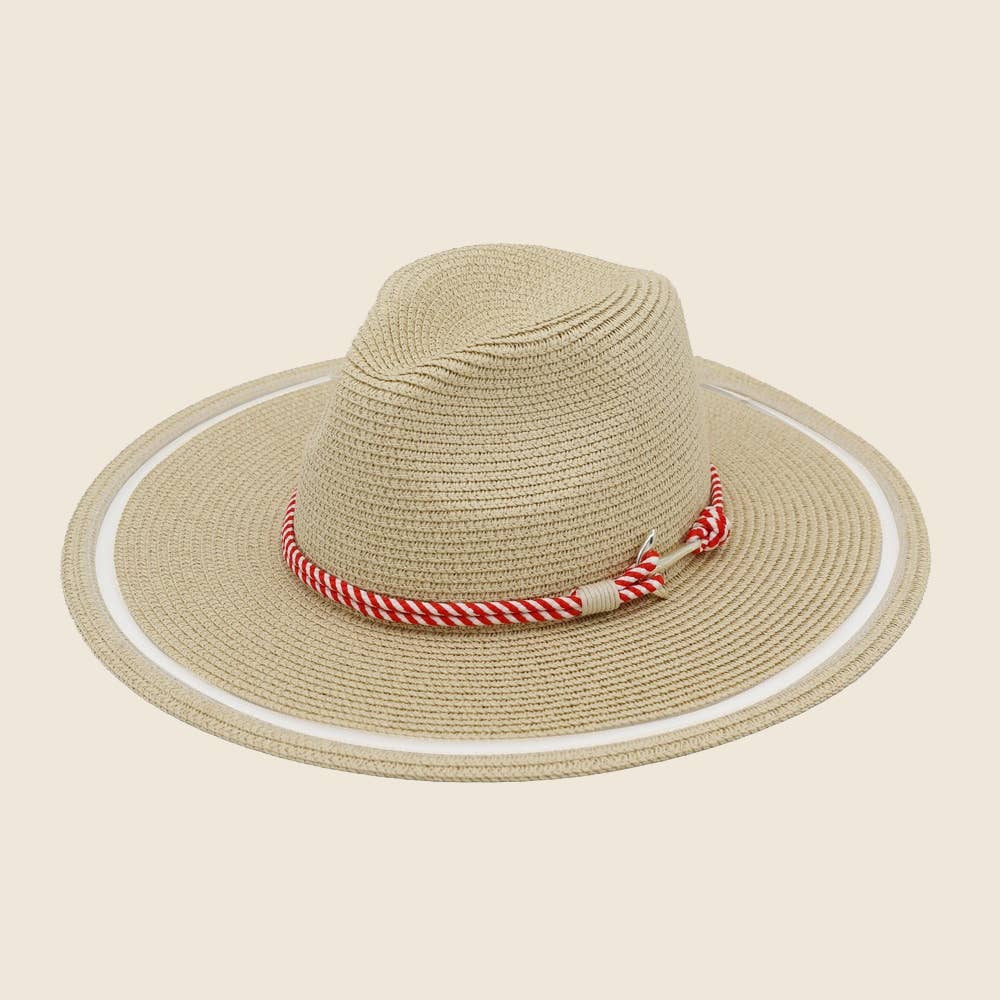 Beige straw hat with a red and white striped band on a beige background