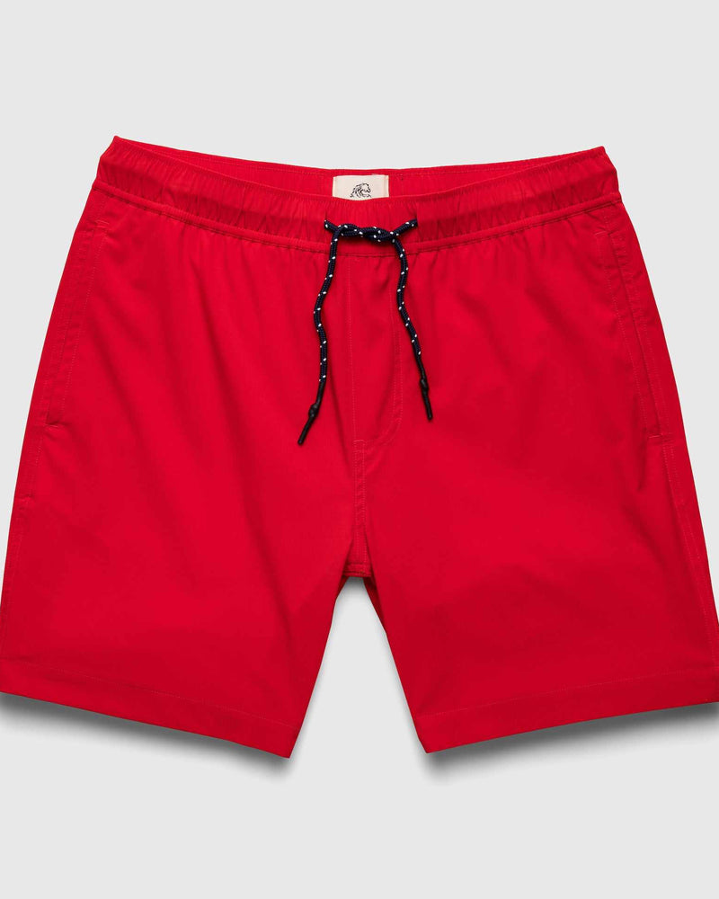 Red shorts with a drawstring on a light gray background