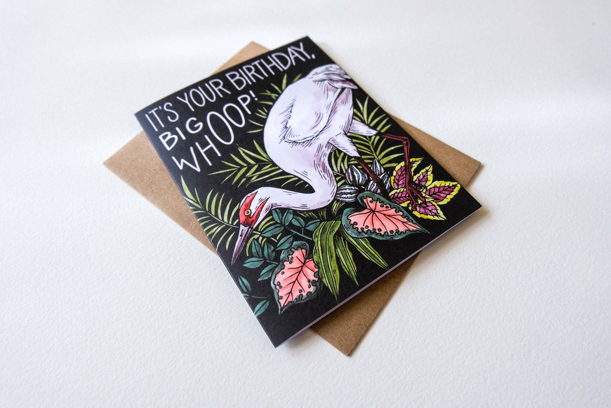 Birthday card with crane design on a white background