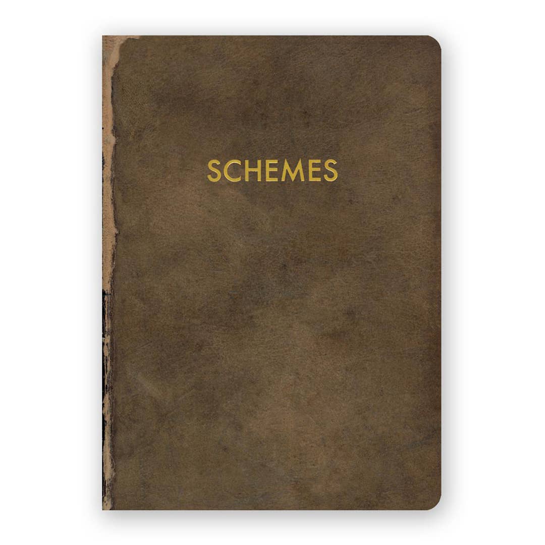 Brown notebook with 'SCHEMES' embossed on the cover against a white background