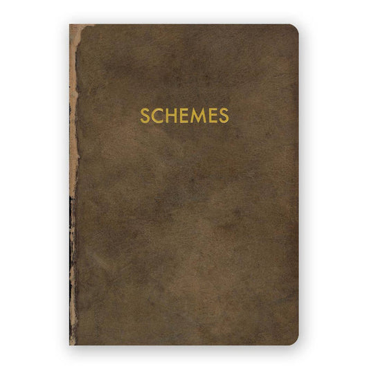 Brown notebook with 'SCHEMES' embossed on the cover against a white background