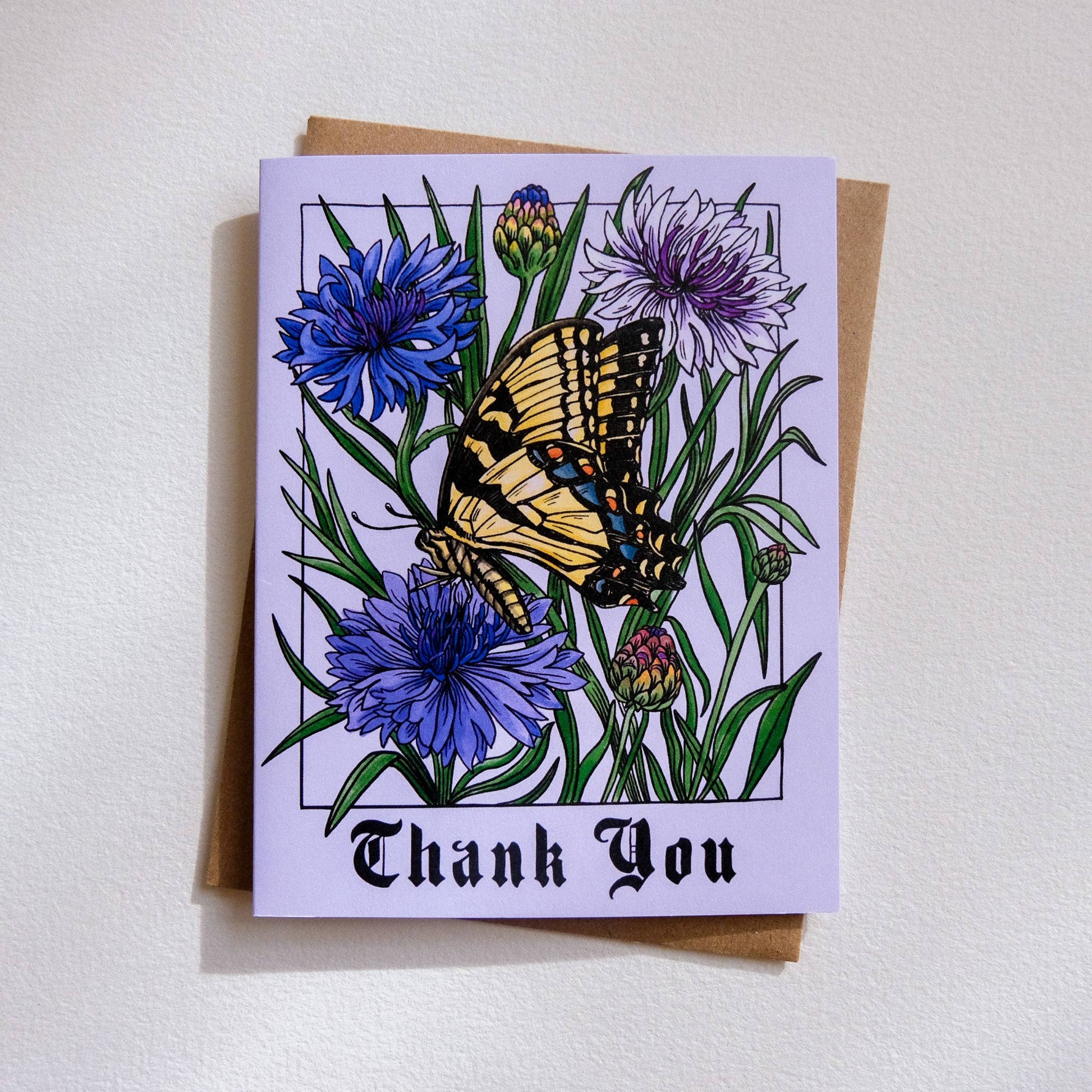 Greeting card with butterfly and flowers design on a white background