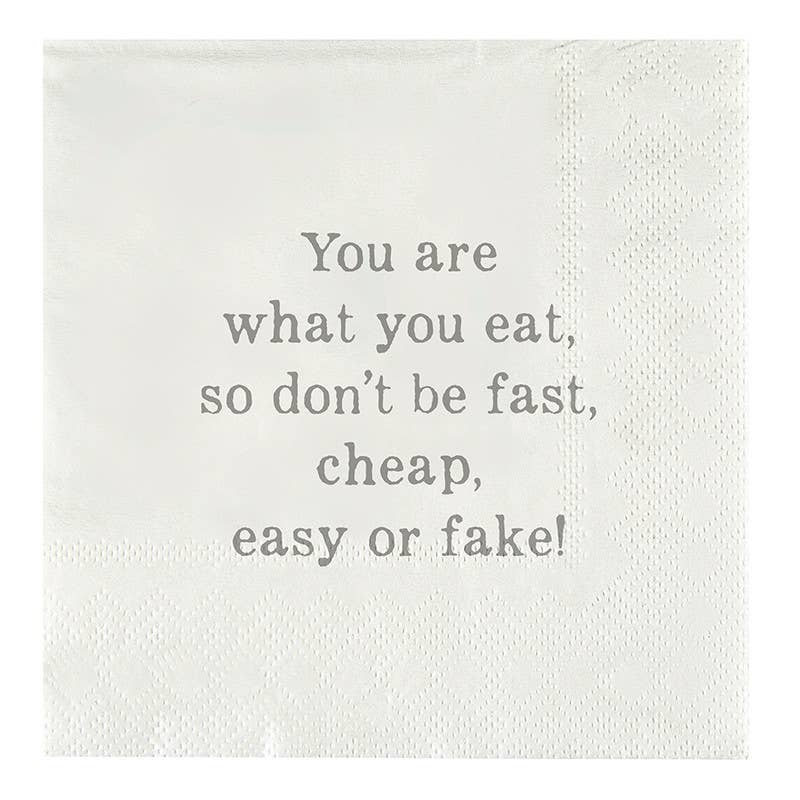 A square white paper napkin with embossed texture and printed gray text that reads, 'You are what you eat, so don't be fast, cheap, easy or fake!' on a plain white background.