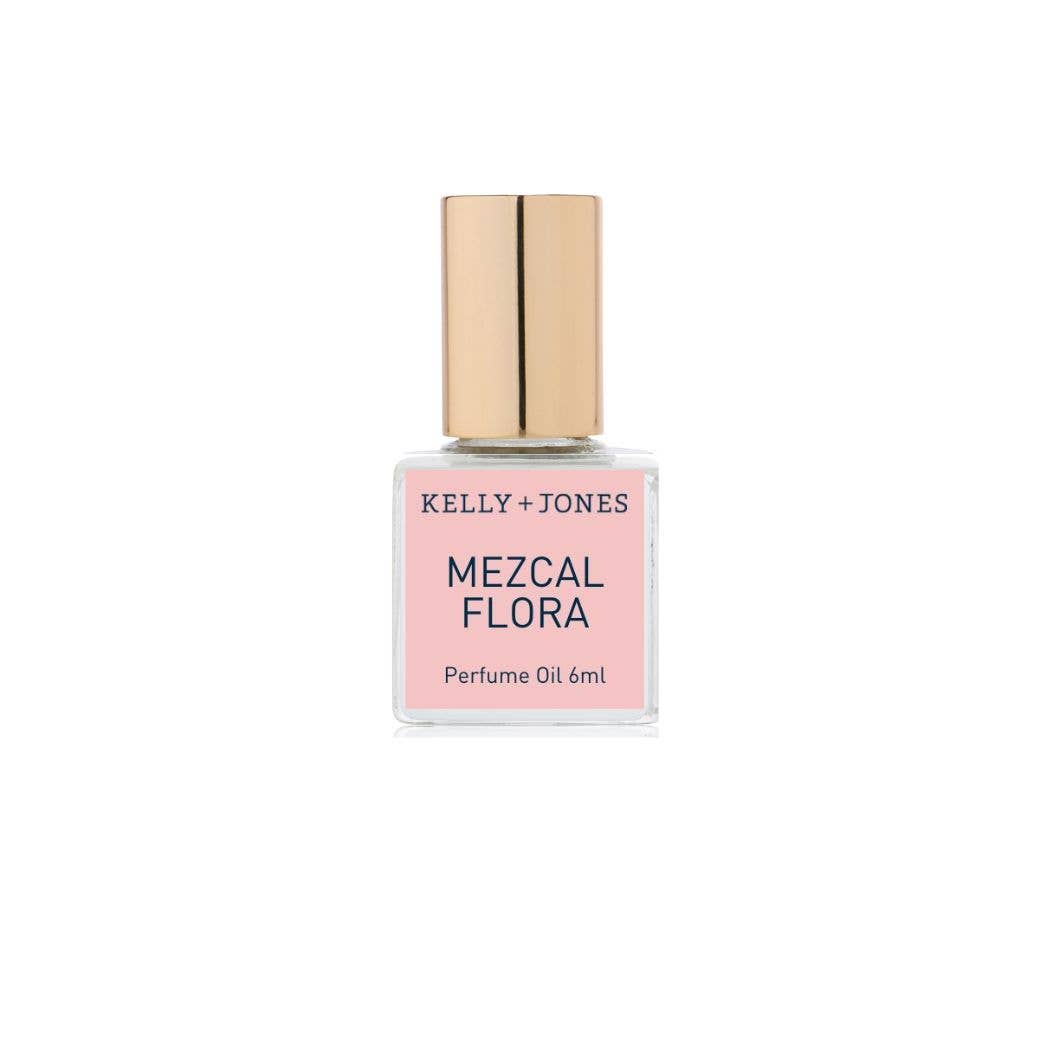 Perfume oil bottle labeled 'Mezcal Flora' by Kelly + Jones on a white background