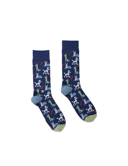 Pair of blue socks with dog pattern on a white background