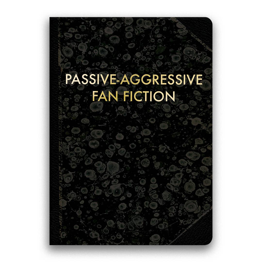 Black notebook with gold text 'Passive-Aggressive Fan Fiction' on a white background