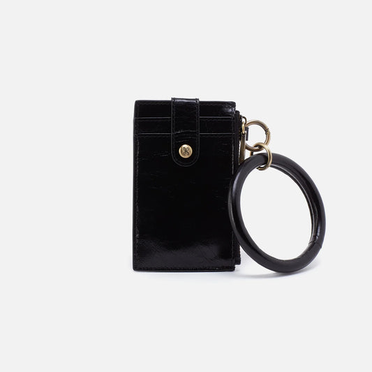 Black keychain with a ring on a white background