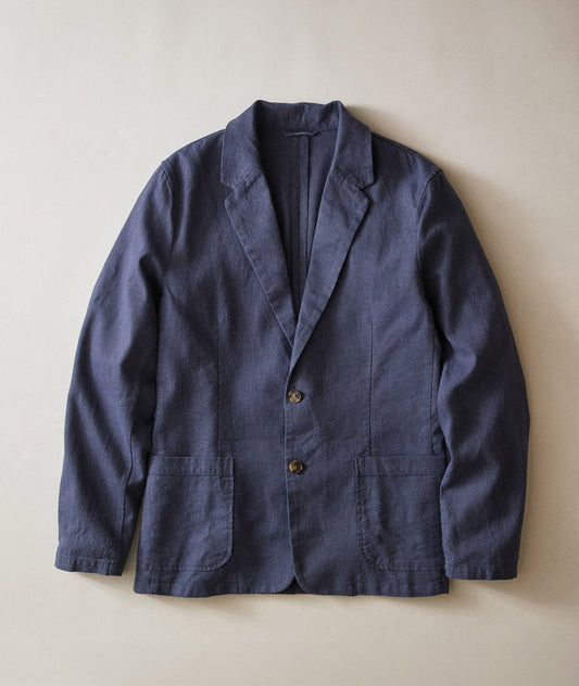 Blue blazer on a beige background