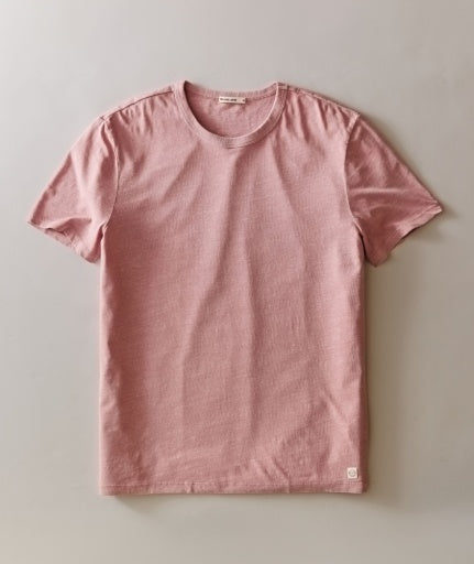 Pink t-shirt on a light gray background