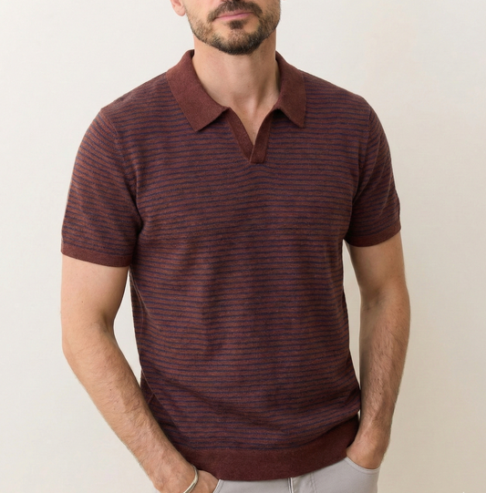 Man wearing a brown striped polo shirt against a plain background
