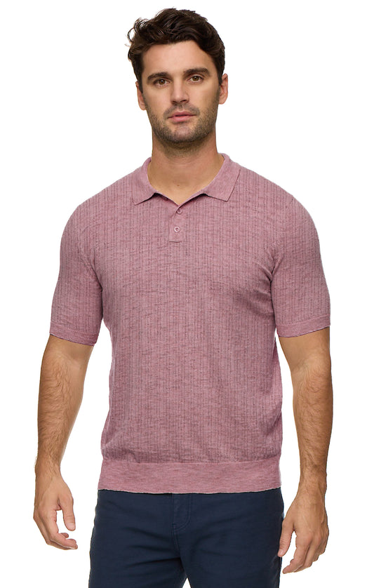 Man wearing a pink textured polo shirt on a white background