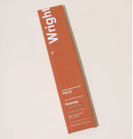 A packaged incense product labeled 'Wright' by Yield, containing 15 incense sticks, with a height of 10.5 inches.